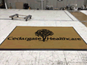 Custom Made Faux Coir Logo Mat Cedar Gate Healthcare LLC of Poplar Bluff Missouri