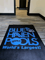 Custom Made Spectrum Logo Mat Blue Haven Pools of Charlotte South Carolina