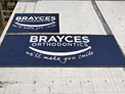 Custom Made Spectrum Logo Rug Brayces Orthodontics of Somers Point New Jersey