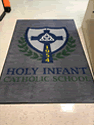 Custom Made Spectrum Logo Rug Holy Infant School of Ballwin Missouri