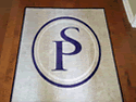 Custom Made Spectrum Logo Rug The Law Office of Shane Phelps of Bryan Texas