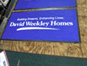 Custom Made ToughTop Logo Mat David Weekely Homes of Houston Texas